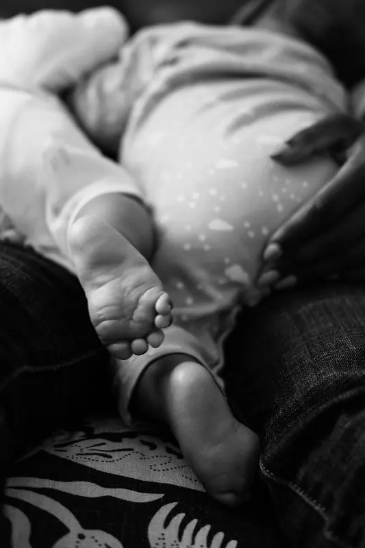 A close photograph of tiny feet